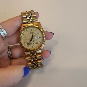 Gold Seiko Watch with Day-Date Display